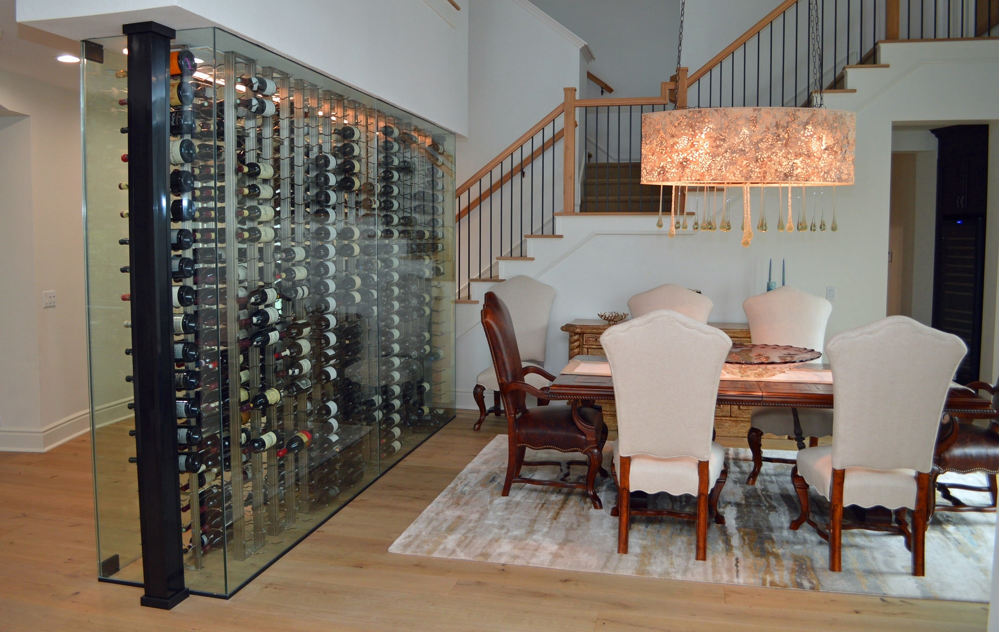 Glass Wine Cellar In Dining Room